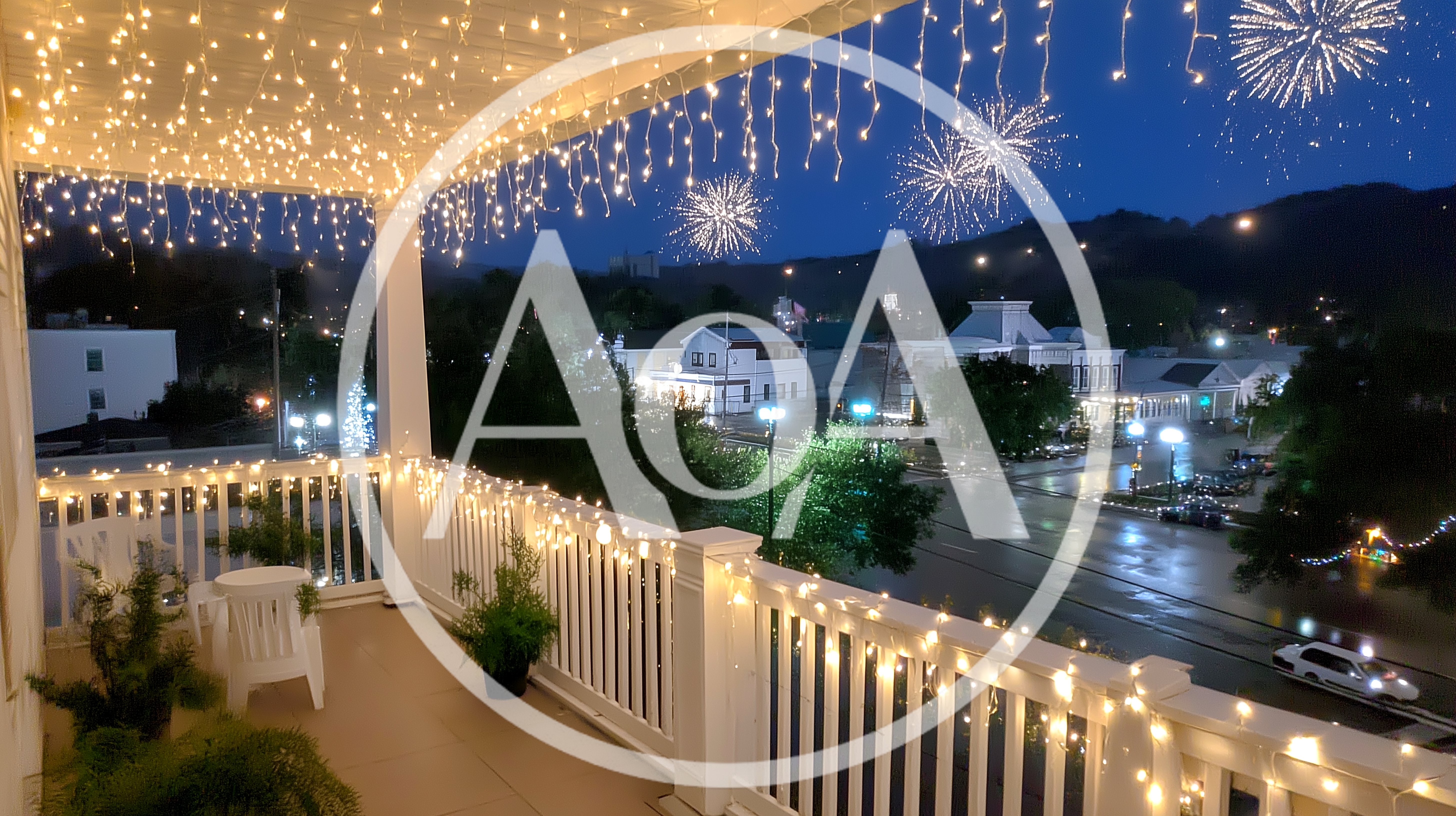 Fireworks Display Over A Small Town At Night