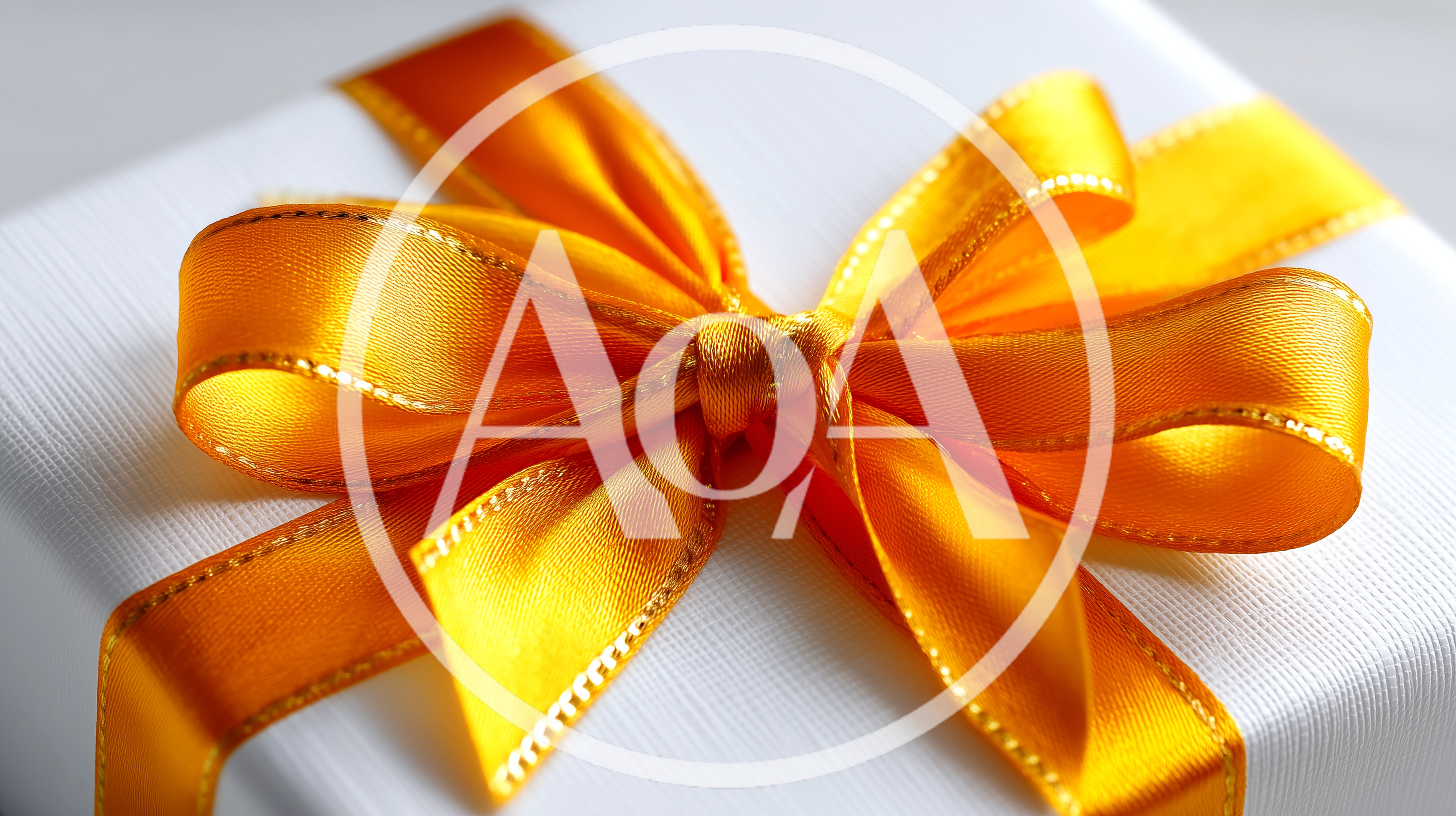 Yellow Satin Ribbon Bow On White Gift Box