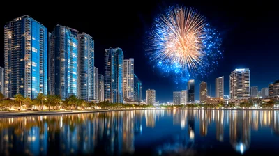 Fireworks Display Over Modern City Skyline At Night