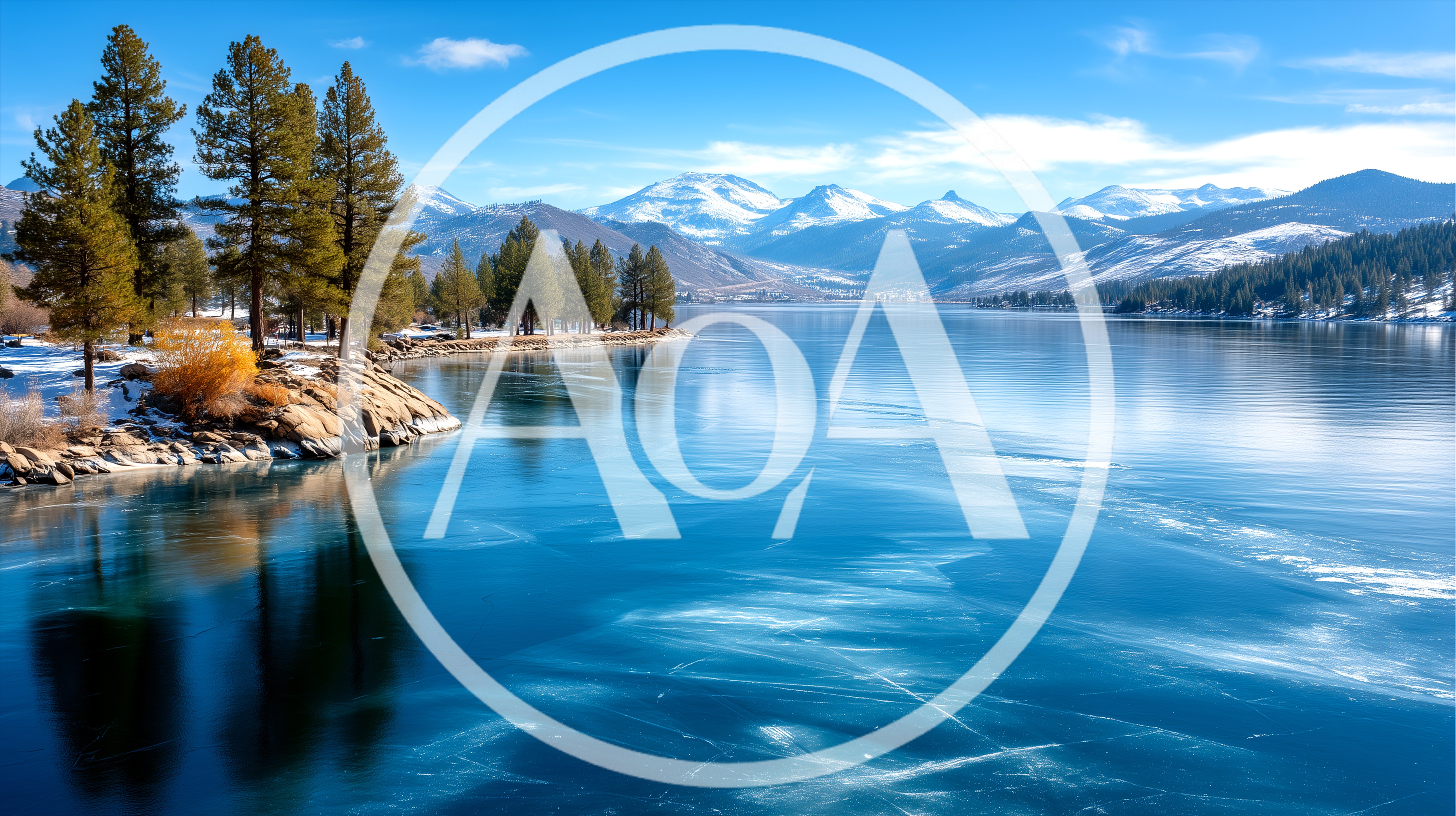 Frozen Lake Surface With Snow Covered Mountains