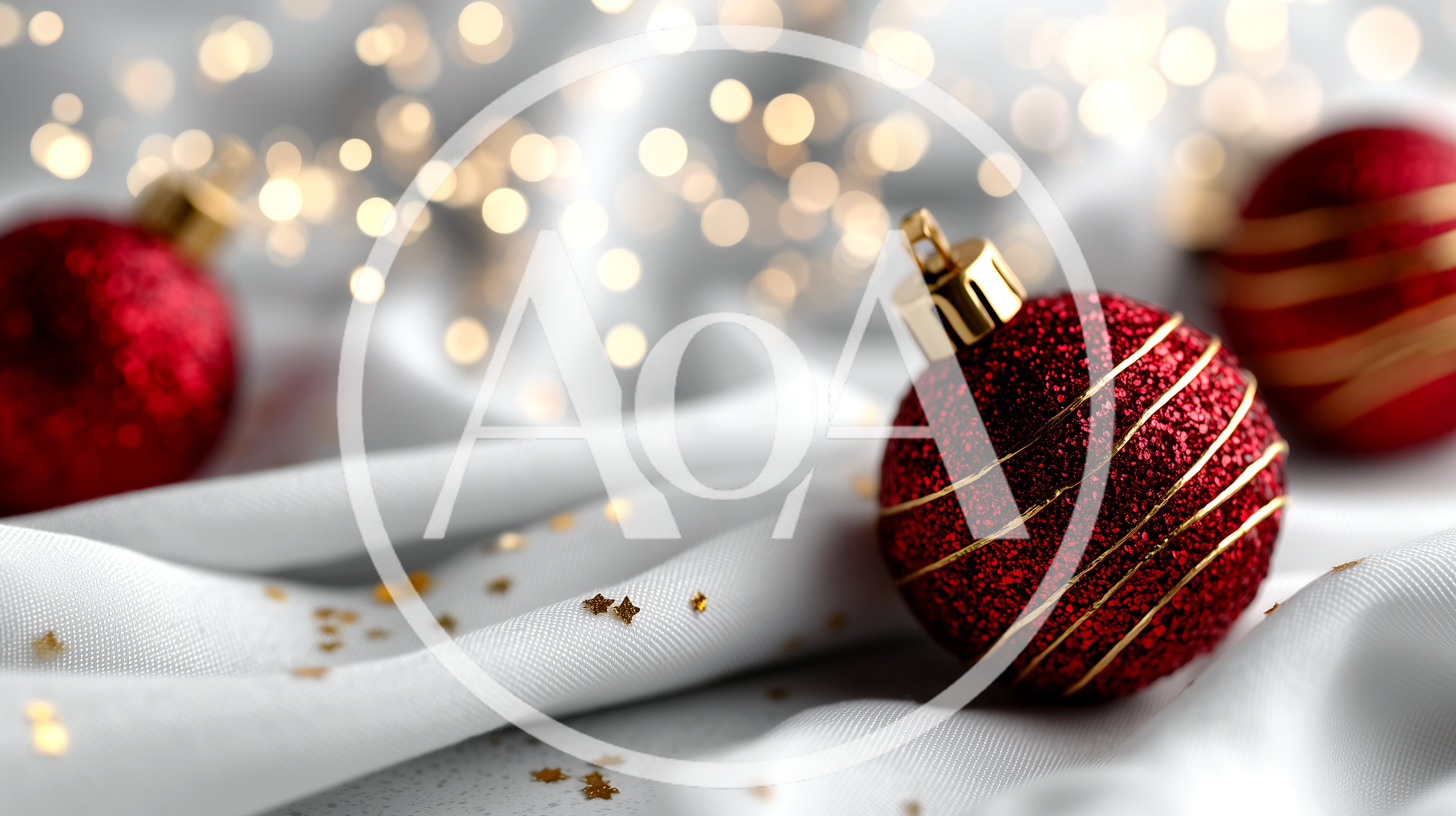 Red Christmas Ornaments On White Fabric With Gold Confetti