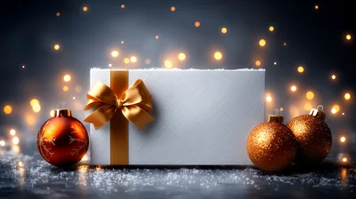 White Gift Box With Gold Ribbon And Christmas Ornaments