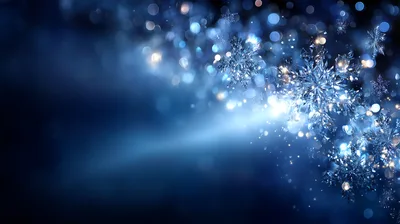 Abstract Blue Background With Glowing Snowflakes And Bokeh