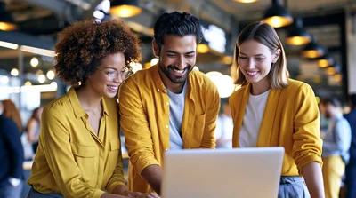 Diverse Professional Team Collaborating On Laptop In Office