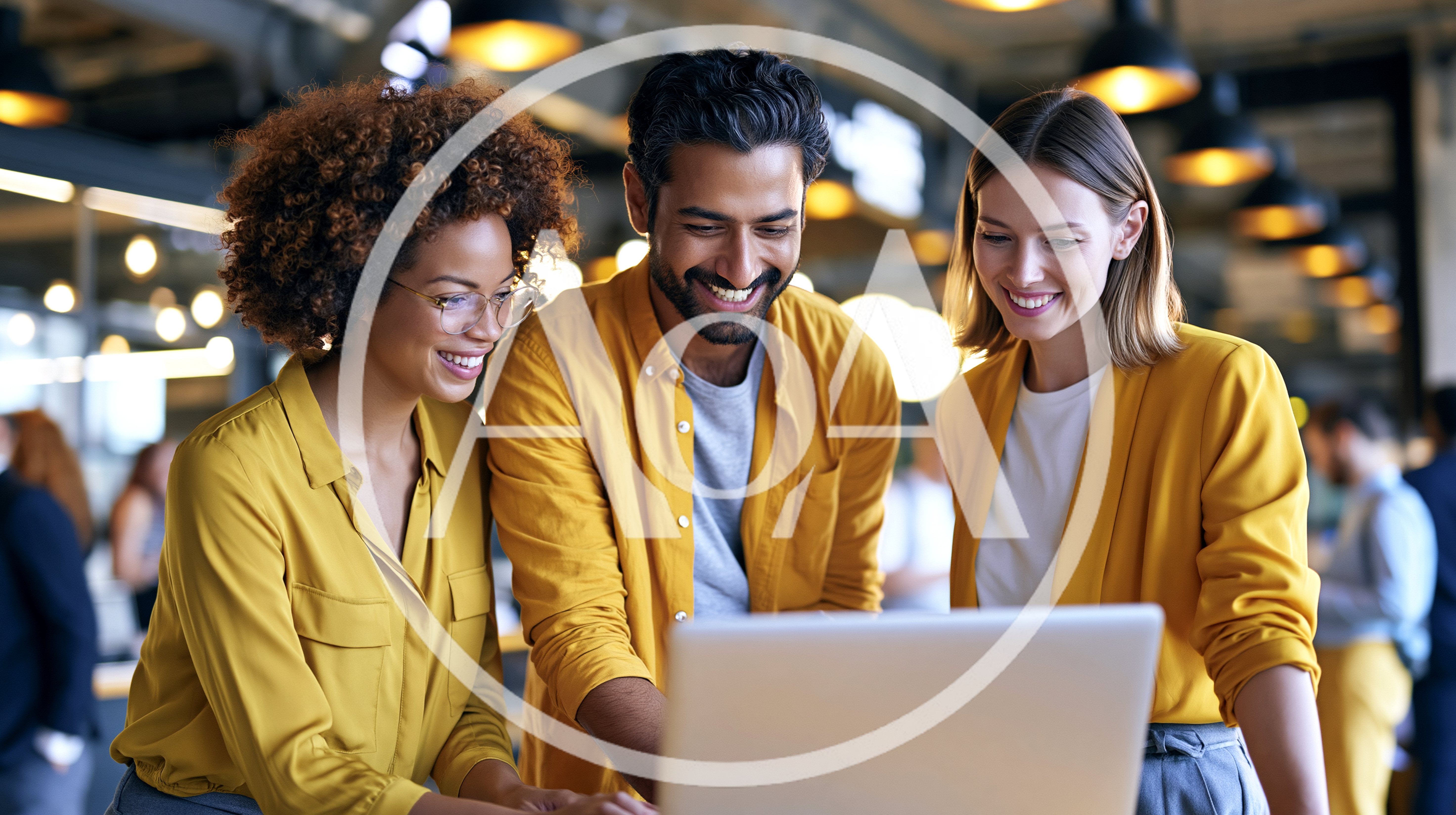 Diverse Professional Team Collaborating On Laptop In Office