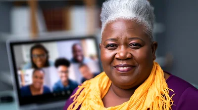 Senior African American Woman Participating In Video Conference
