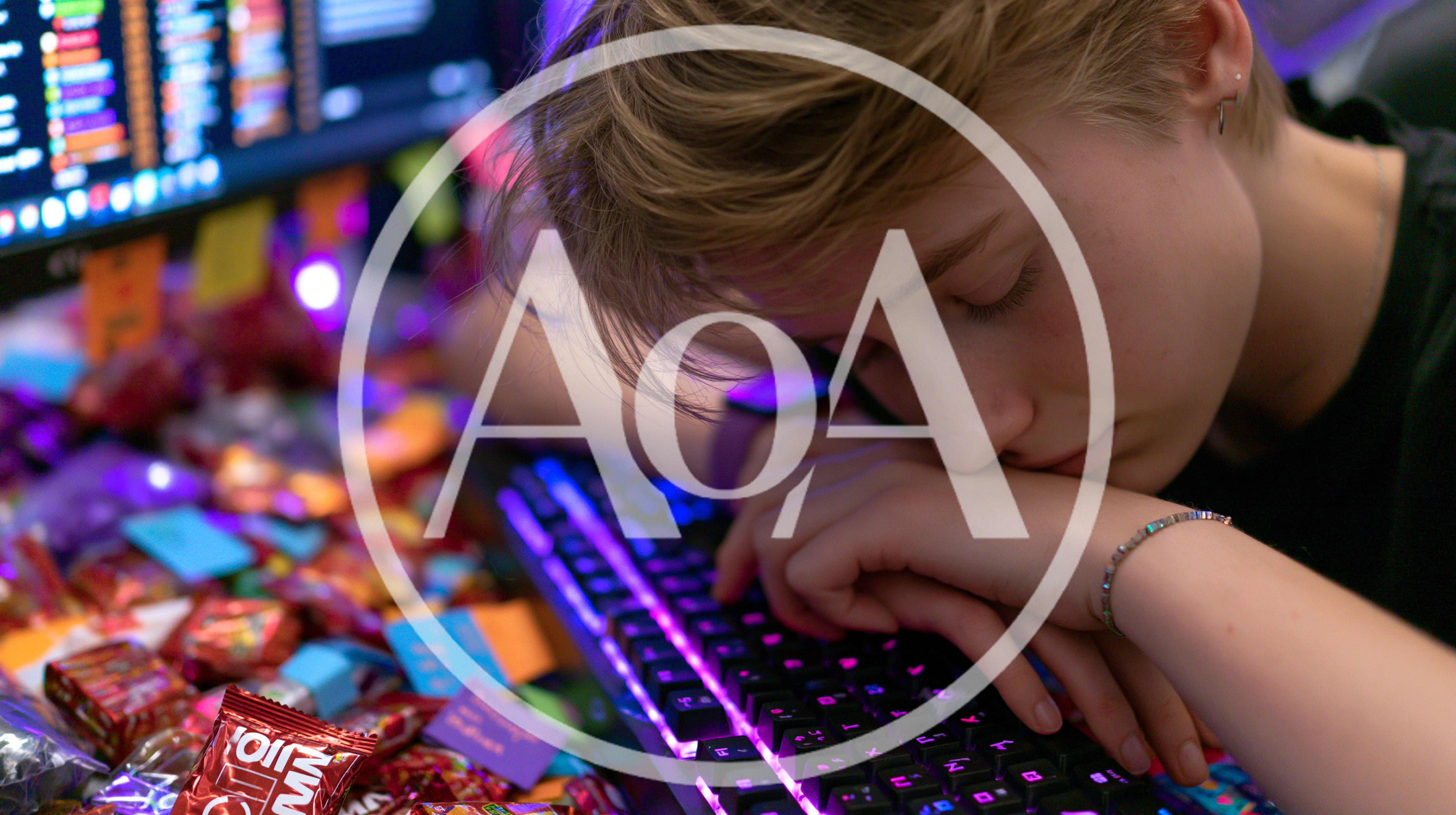 Exhausted Young Gamer Sleeping On Illuminated Keyboard