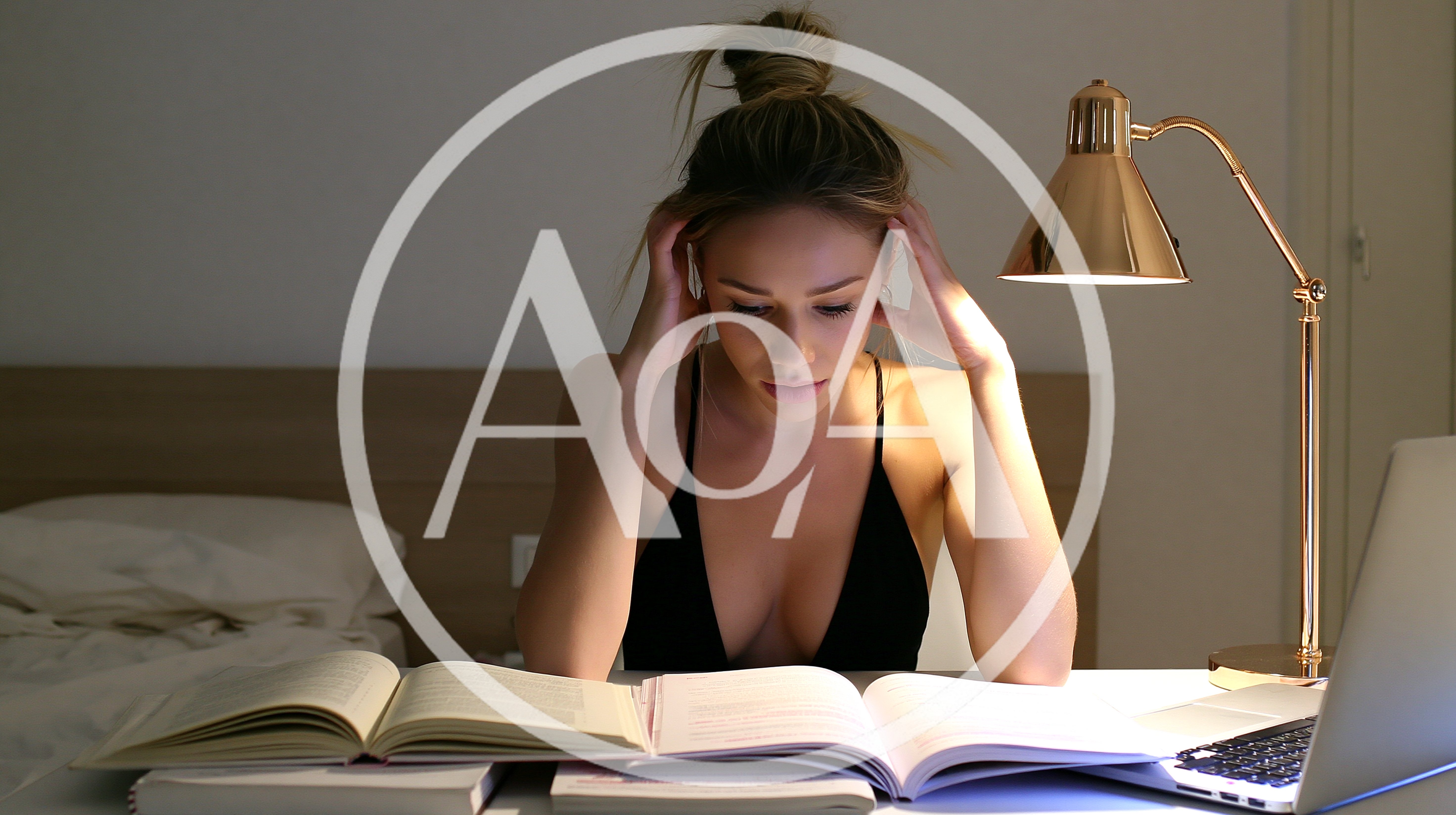 Stressed Young Woman Studying Late At Night