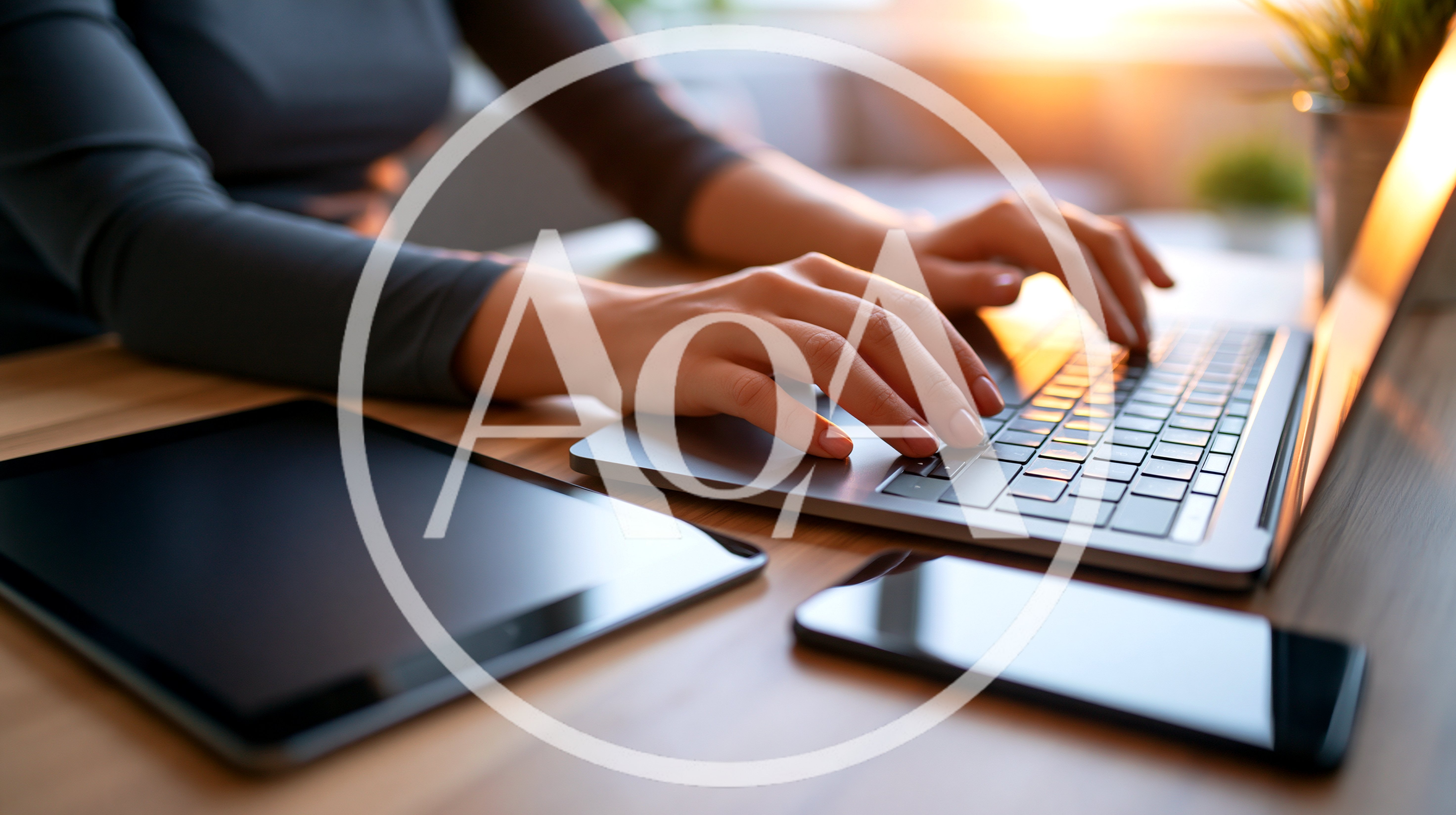 Woman Typing On Laptop With Tablet And Smartphone