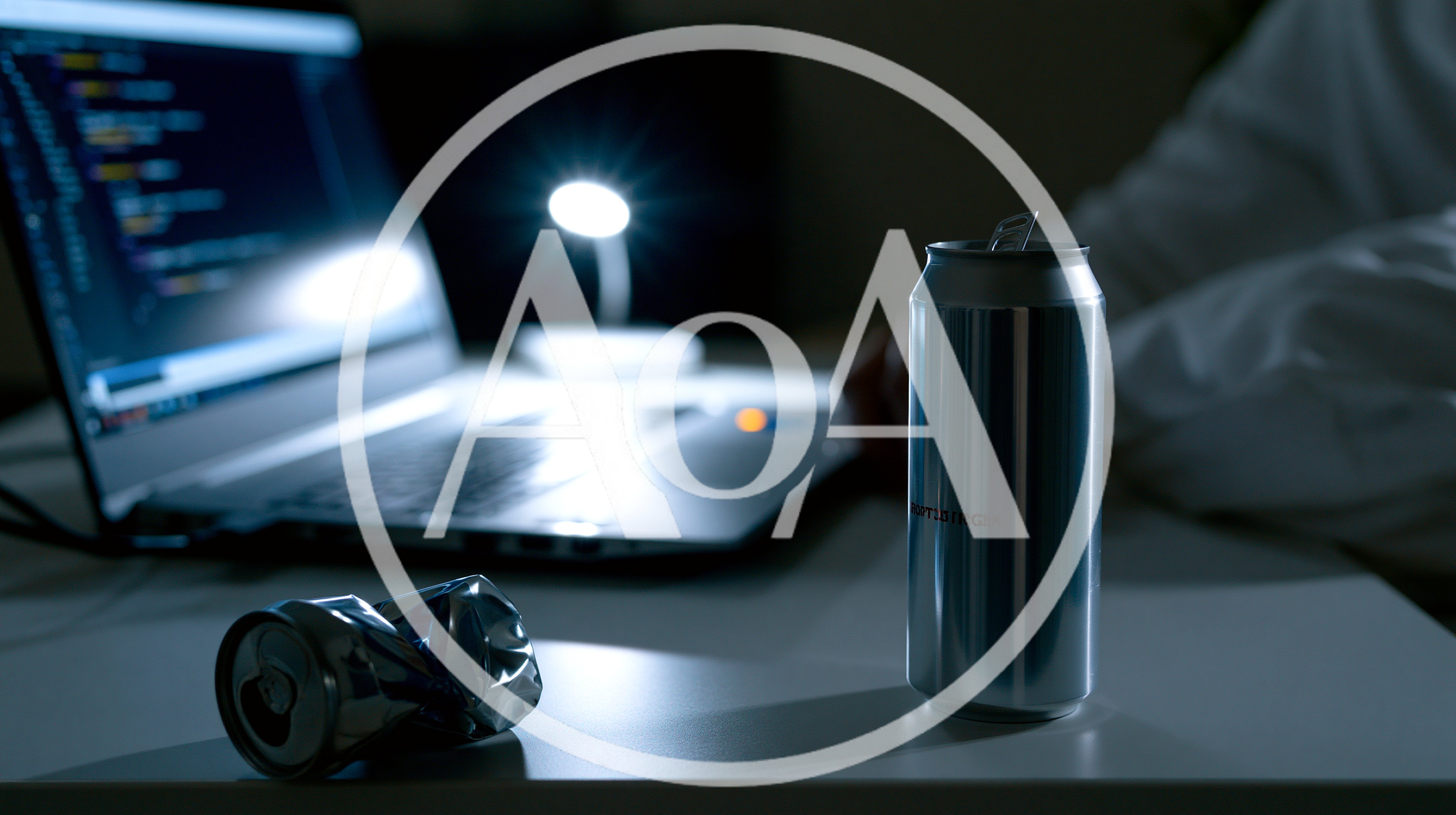 Programmer Working Late With Energy Drinks On Desk