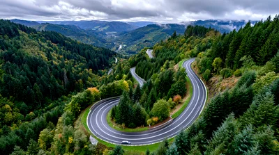 Aerial View Of A Winding Mountain Road