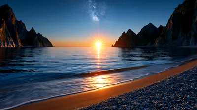 Stunning Sunset Over Rocky Coastal Beach