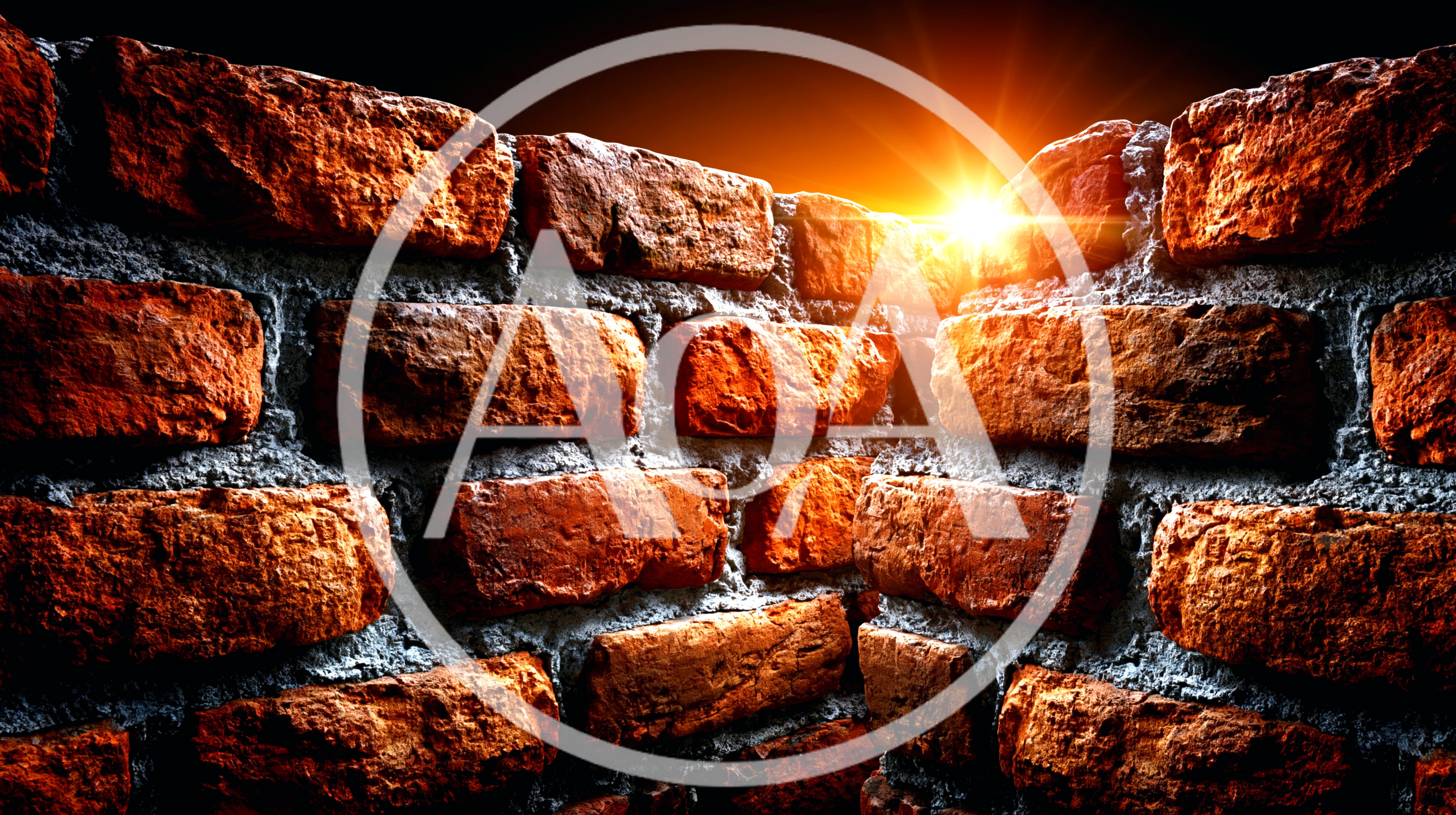 Sunlight Shining Over A Rough Red Brick Wall