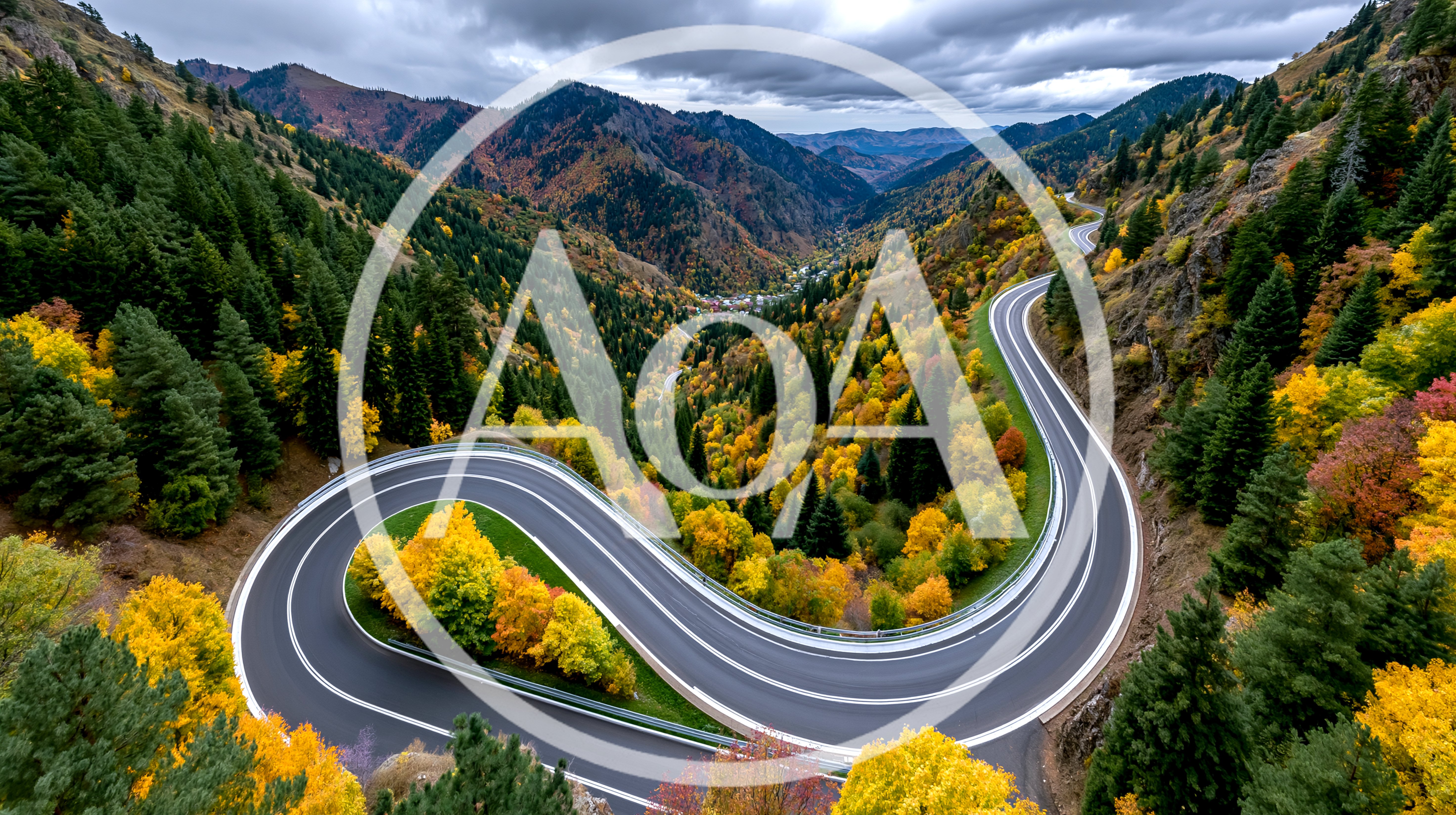 Winding Mountain Road Through Autumn Forest Landscape