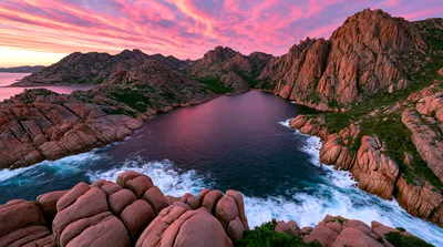 Dramatic Sunset Over Granite Coastal Cliffs And Ocean