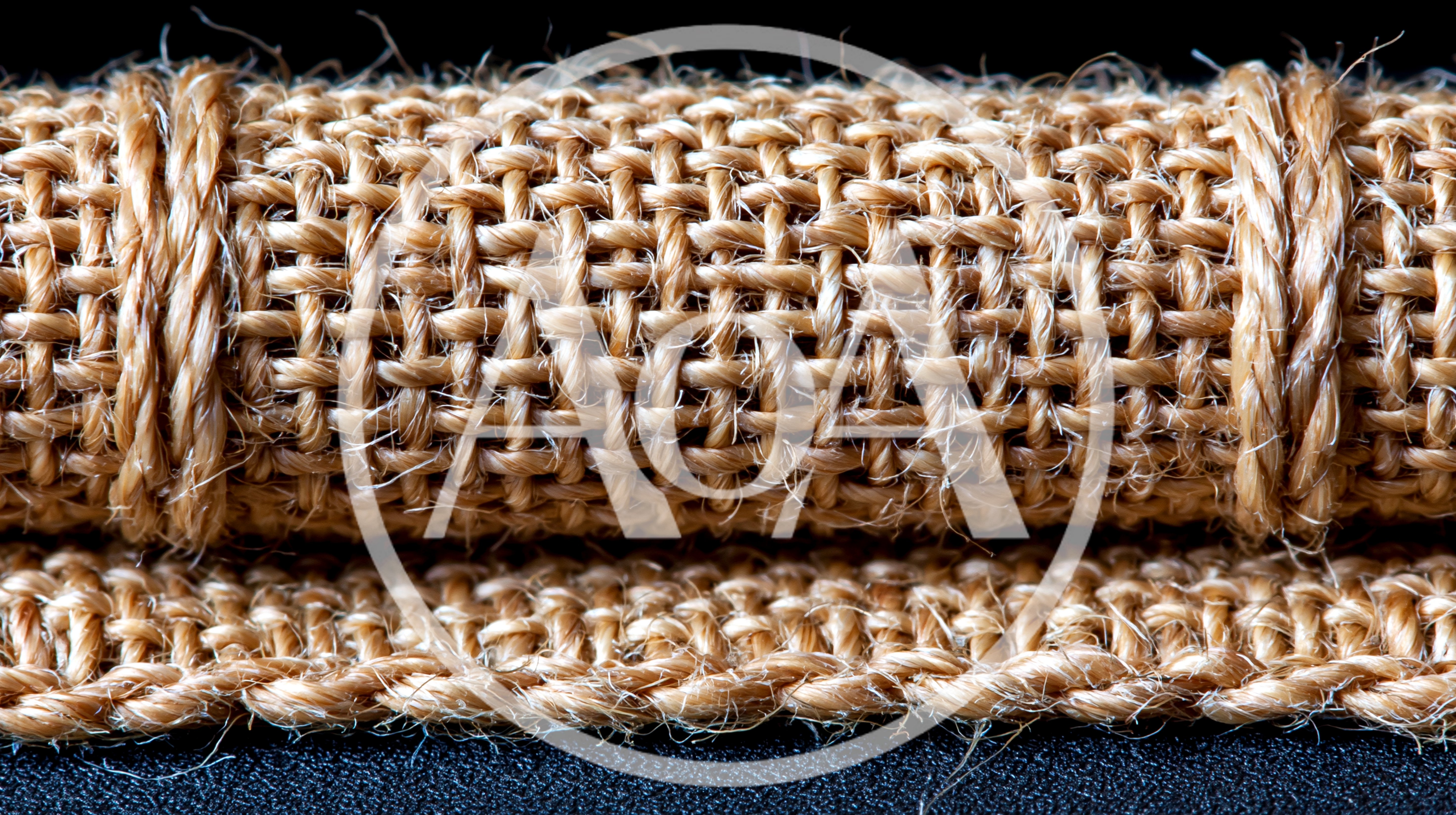 Close Up Of Rolled Burlap Fabric Texture