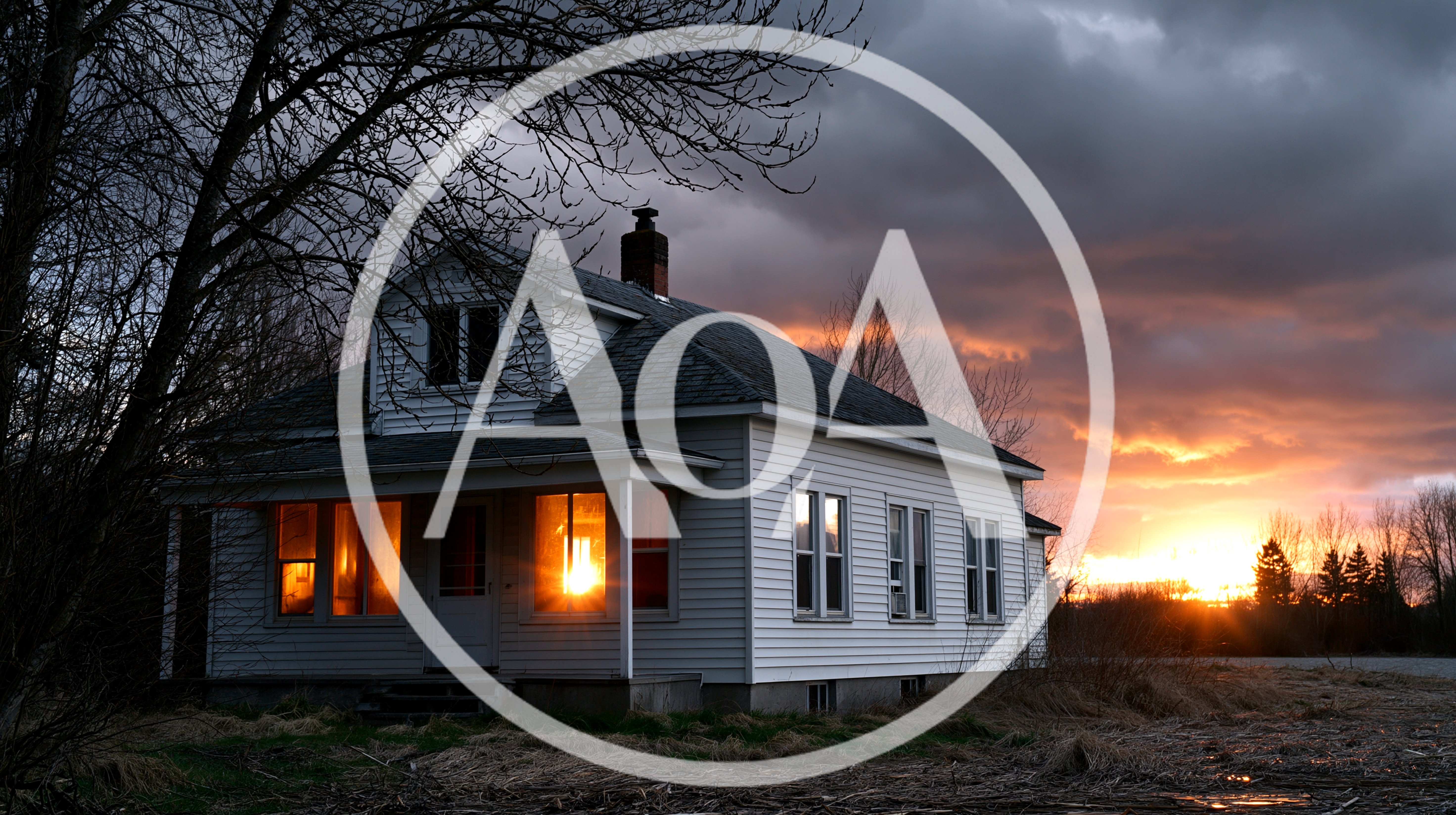 White Farmhouse At Sunset With Glowing Windows