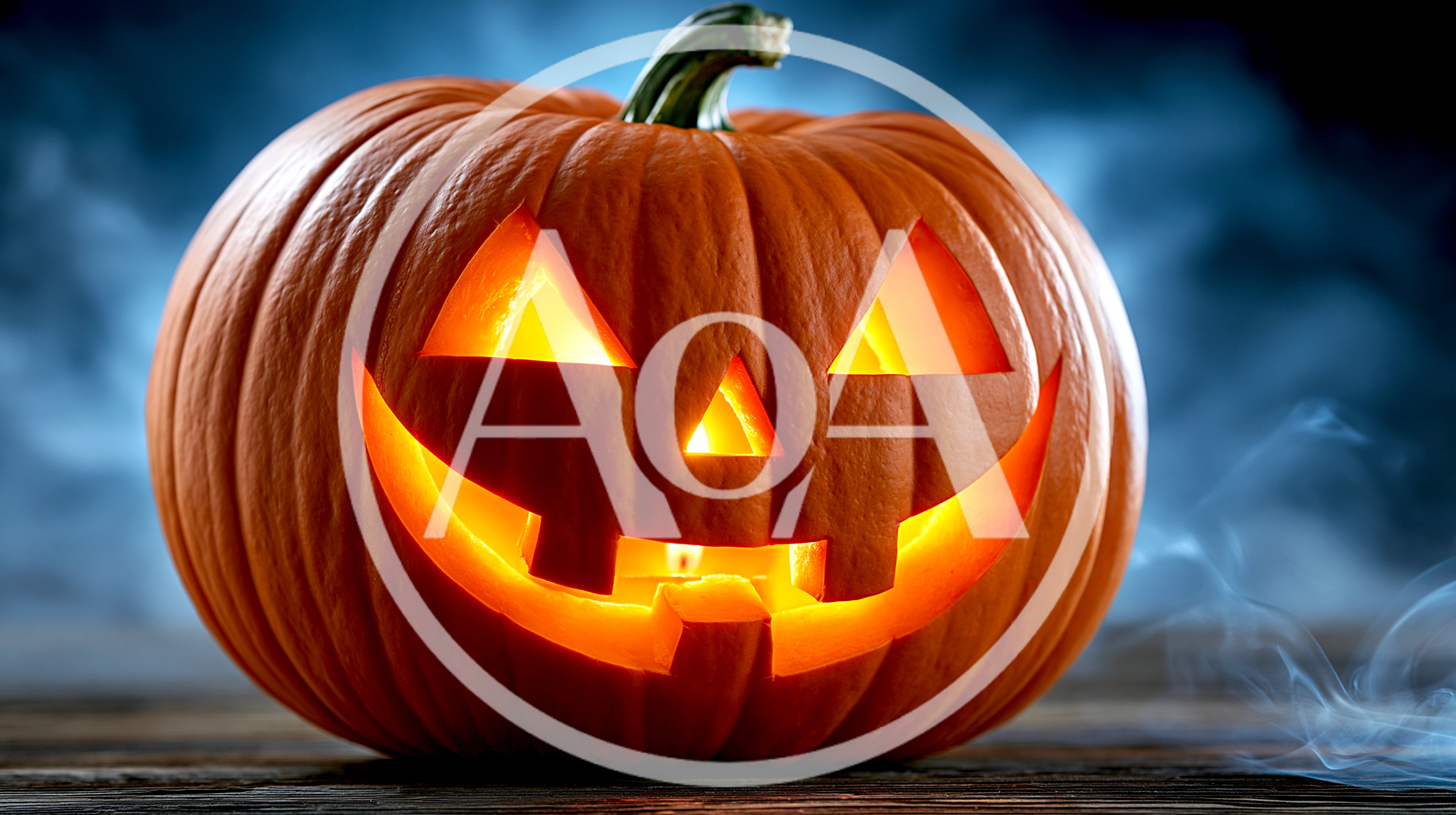 Glowing Jack O Lantern Pumpkin On Wooden Surface