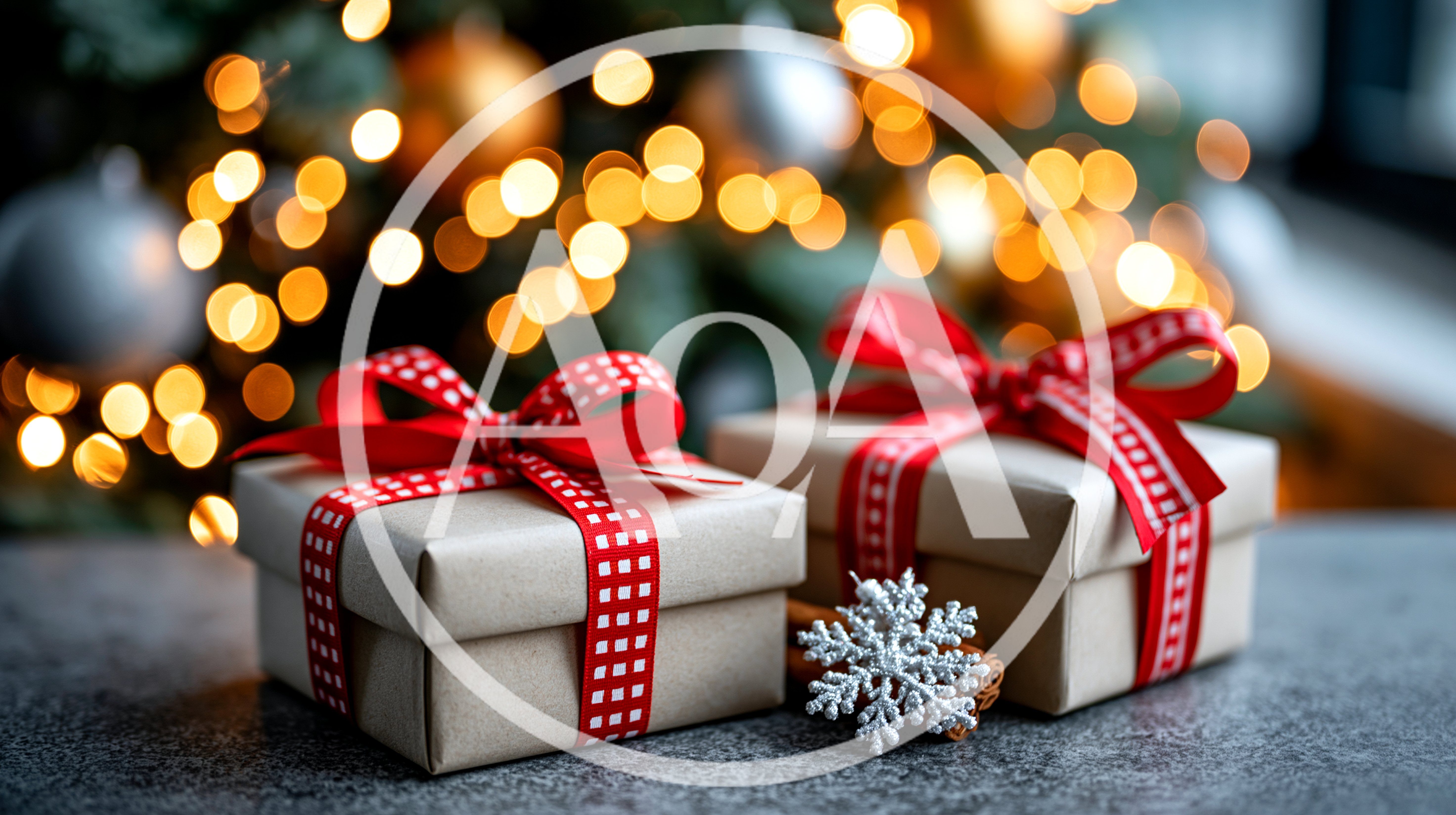 Two Wrapped Christmas Gift Boxes With Red Ribbons