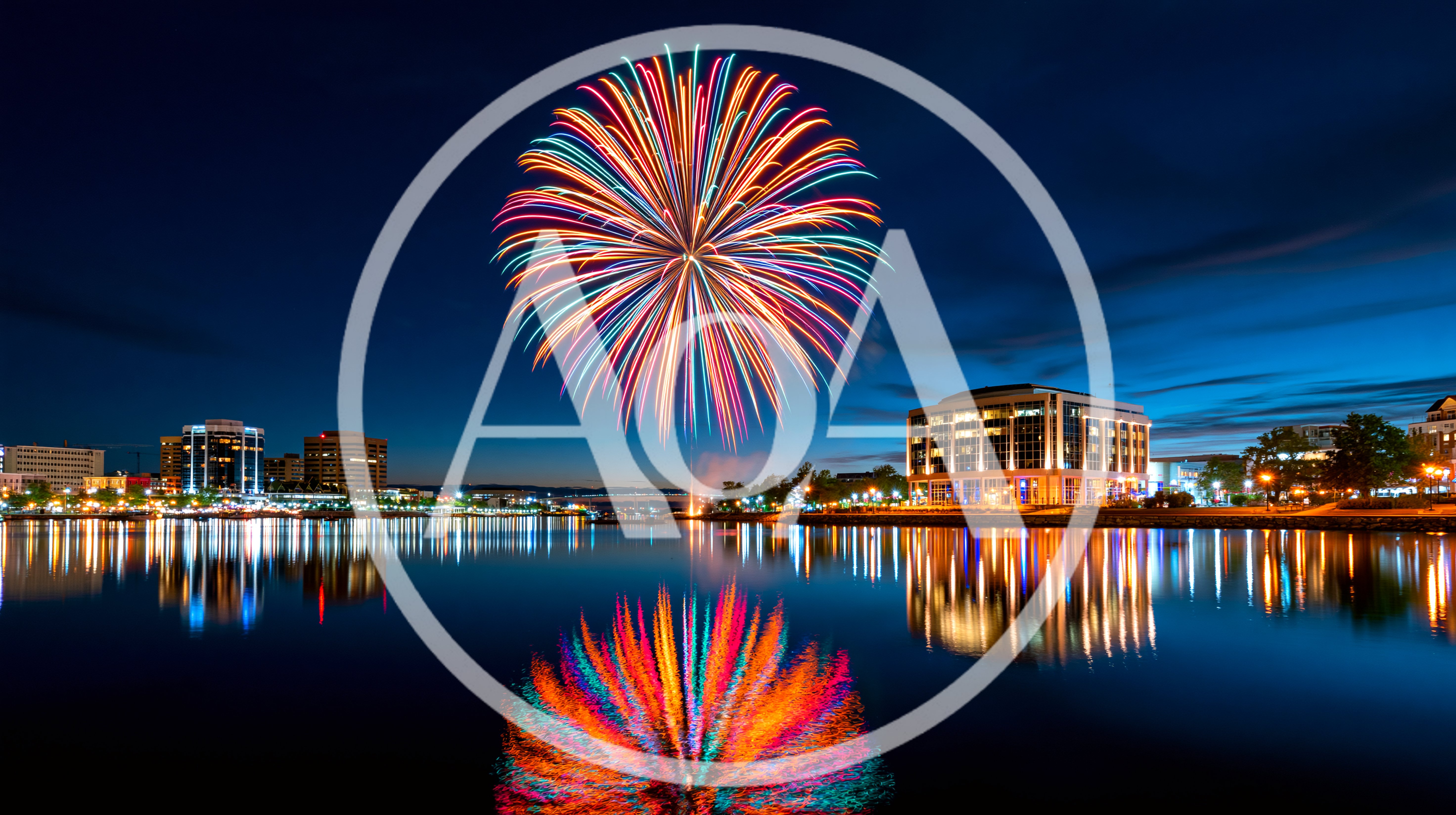Colorful Fireworks Display Over A City Waterfront At Night
