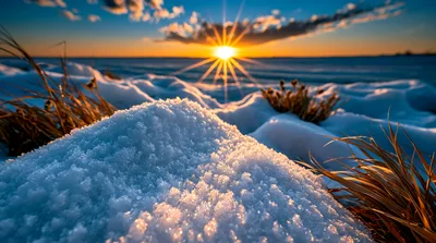 Golden Sunset Over Frozen Snowy Landscape