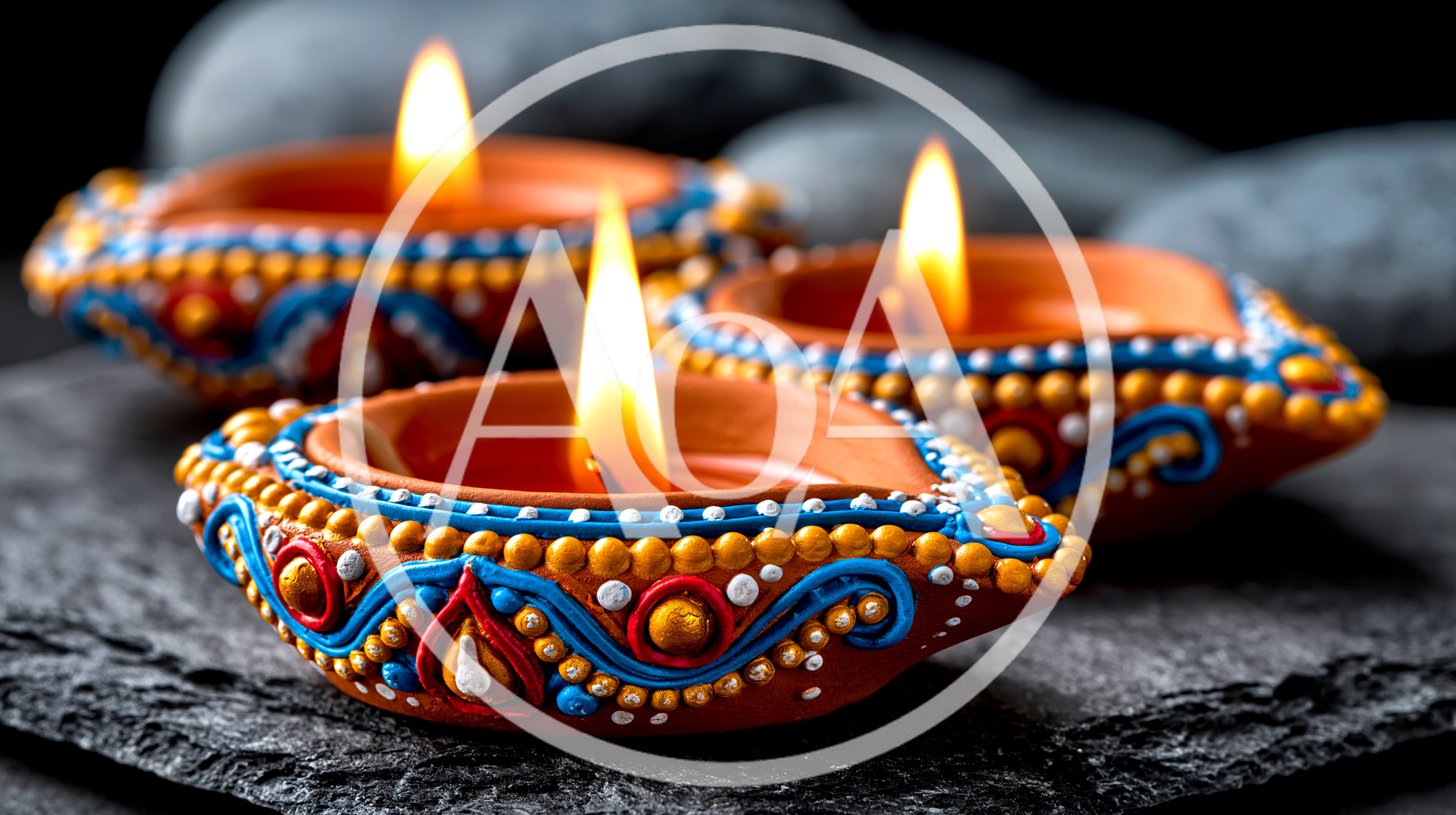 Three Lit Decorative Clay Diyas On Stone Surface