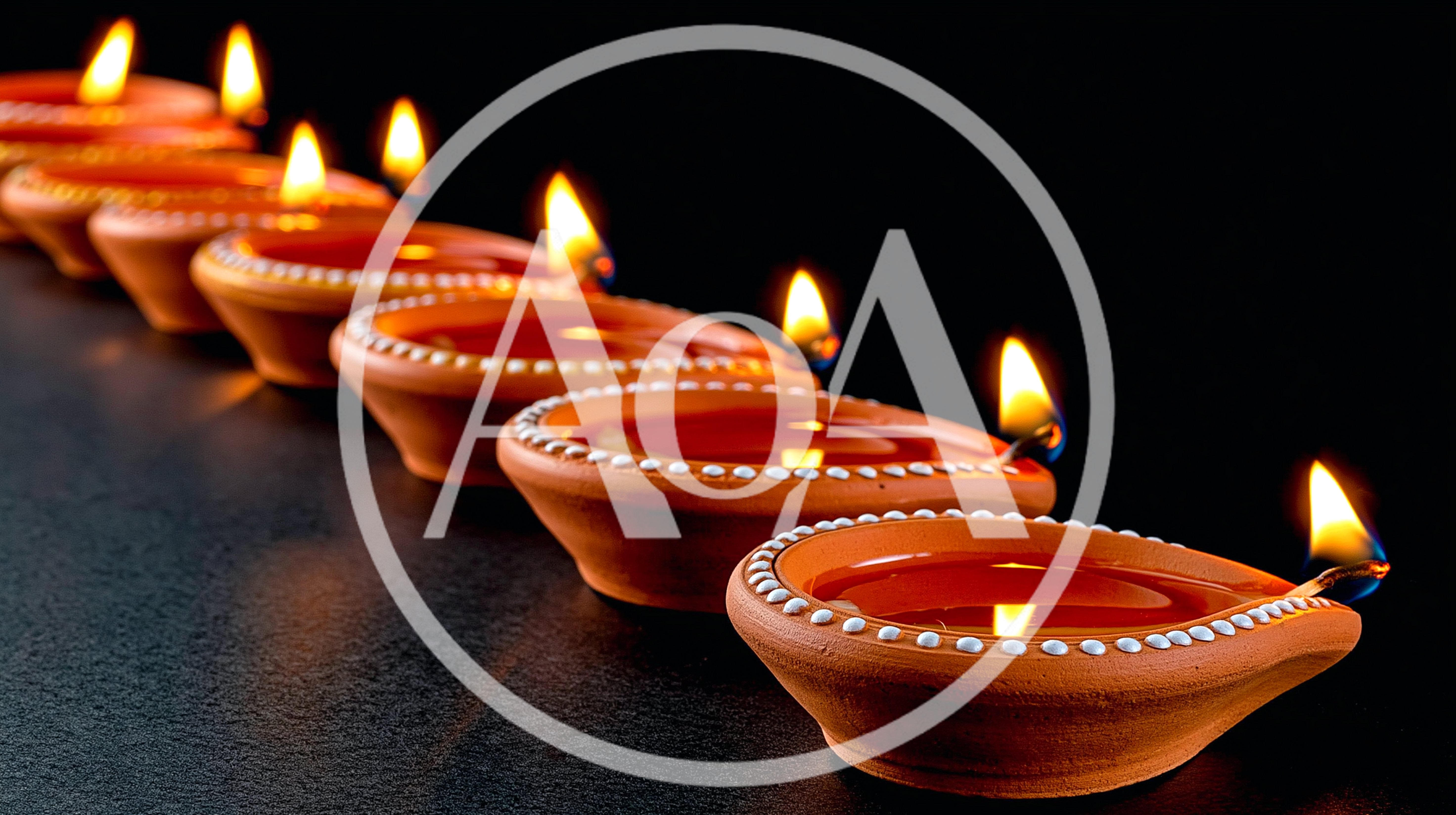 Row Of Lit Clay Diyas For Diwali Celebration