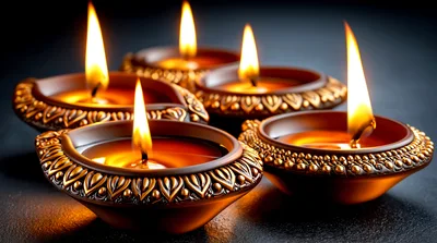 Lit Traditional Clay Diyas For Diwali Celebration