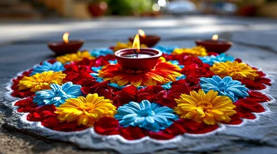 Diwali Rangoli Decoration With Flowers And Lit Diyas