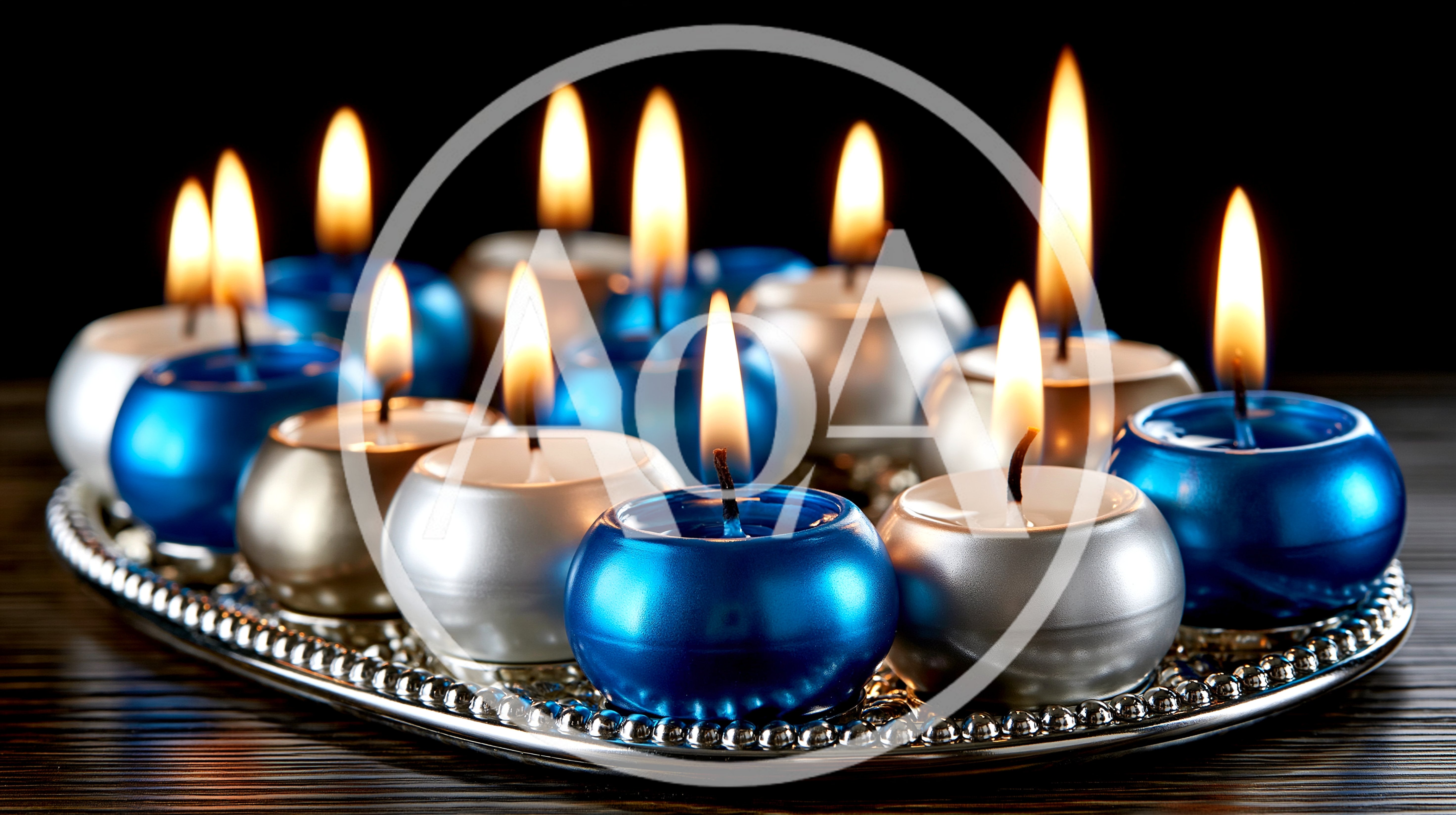 Group of Lit Blue and Silver Candles on Tray