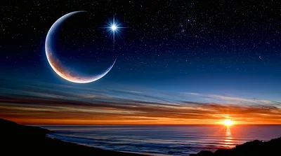 Crescent Moon And Bright Star Over Ocean Sunset