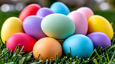 Colorful Easter Eggs Resting In Green Grass