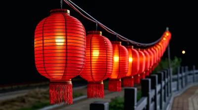 Row of Traditional Red Chinese Lanterns at Night