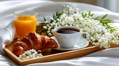 Breakfast Tray With Croissant Coffee And Orange Juice