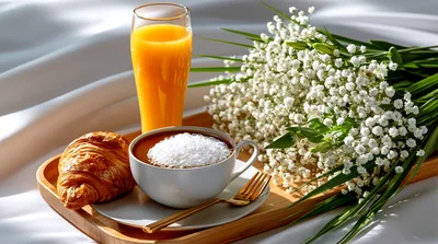 Breakfast Tray With Croissant Coffee And Flowers