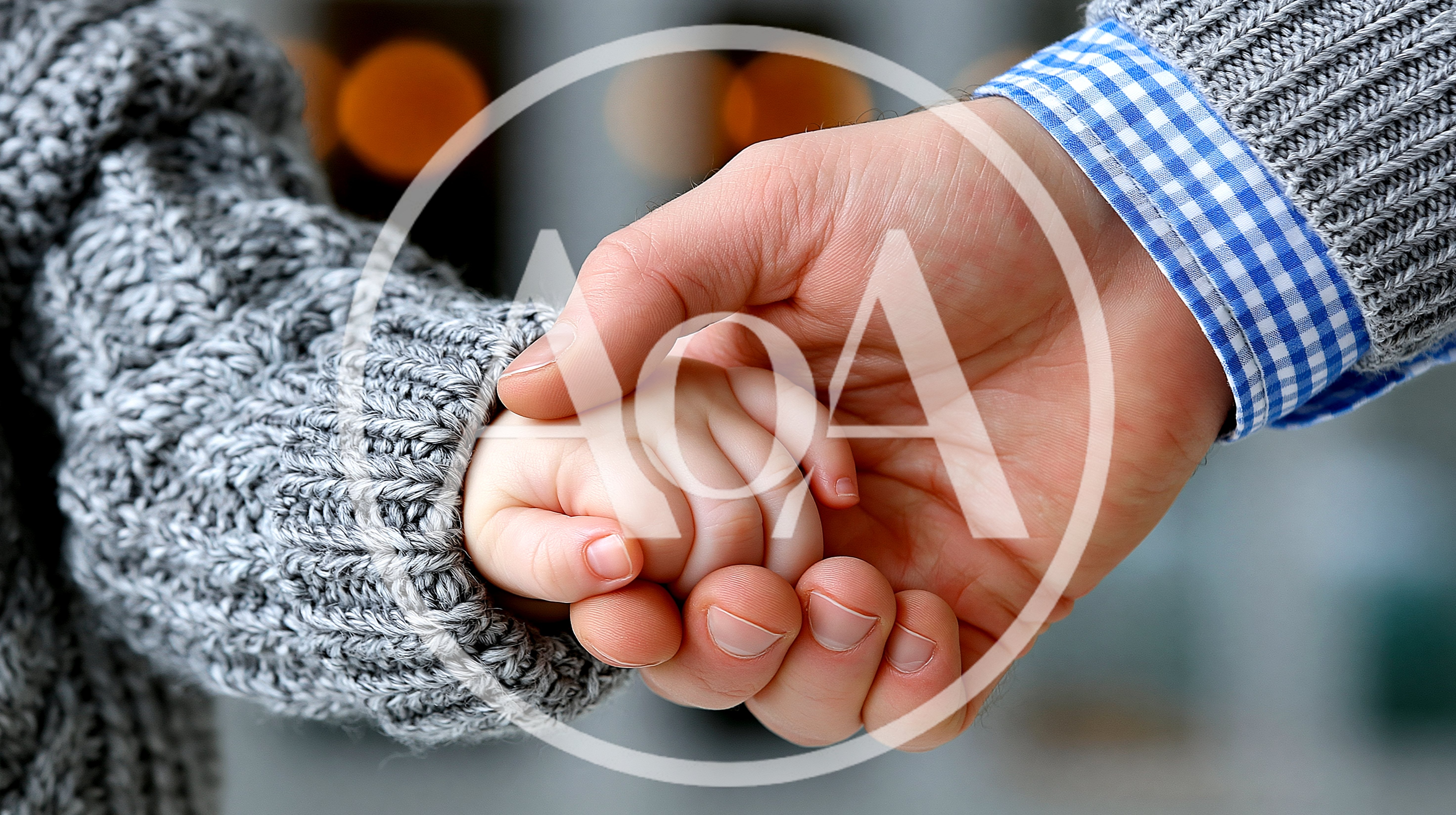 Adult Holding A Small Child Hand