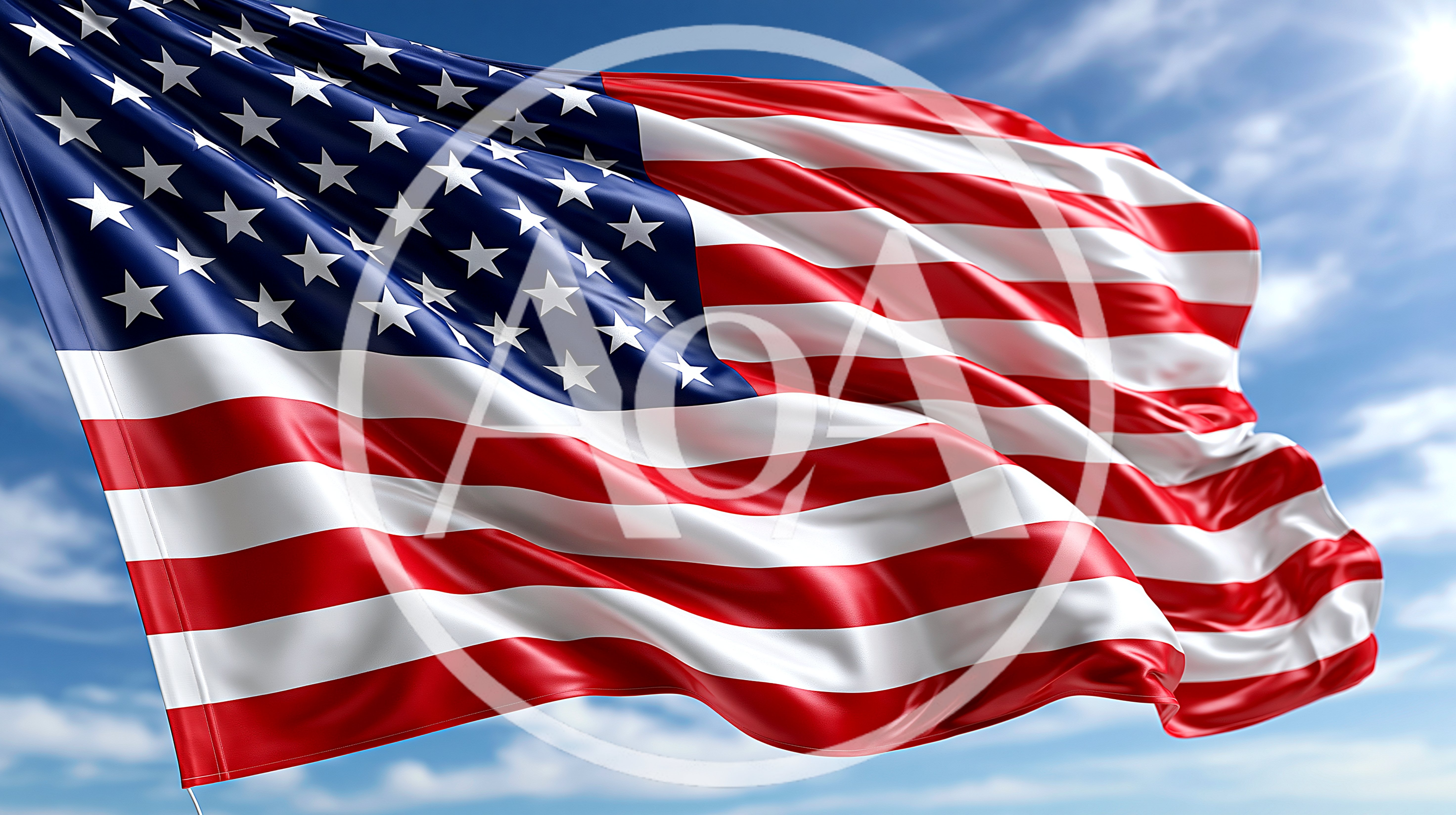 American Flag Waving Against A Bright Blue Sky
