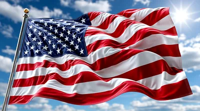 American Flag Waving Against A Sunny Blue Sky