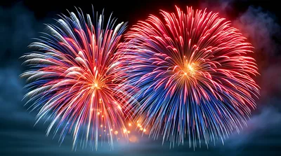 Vibrant Red And Blue Fireworks Display In Night Sky