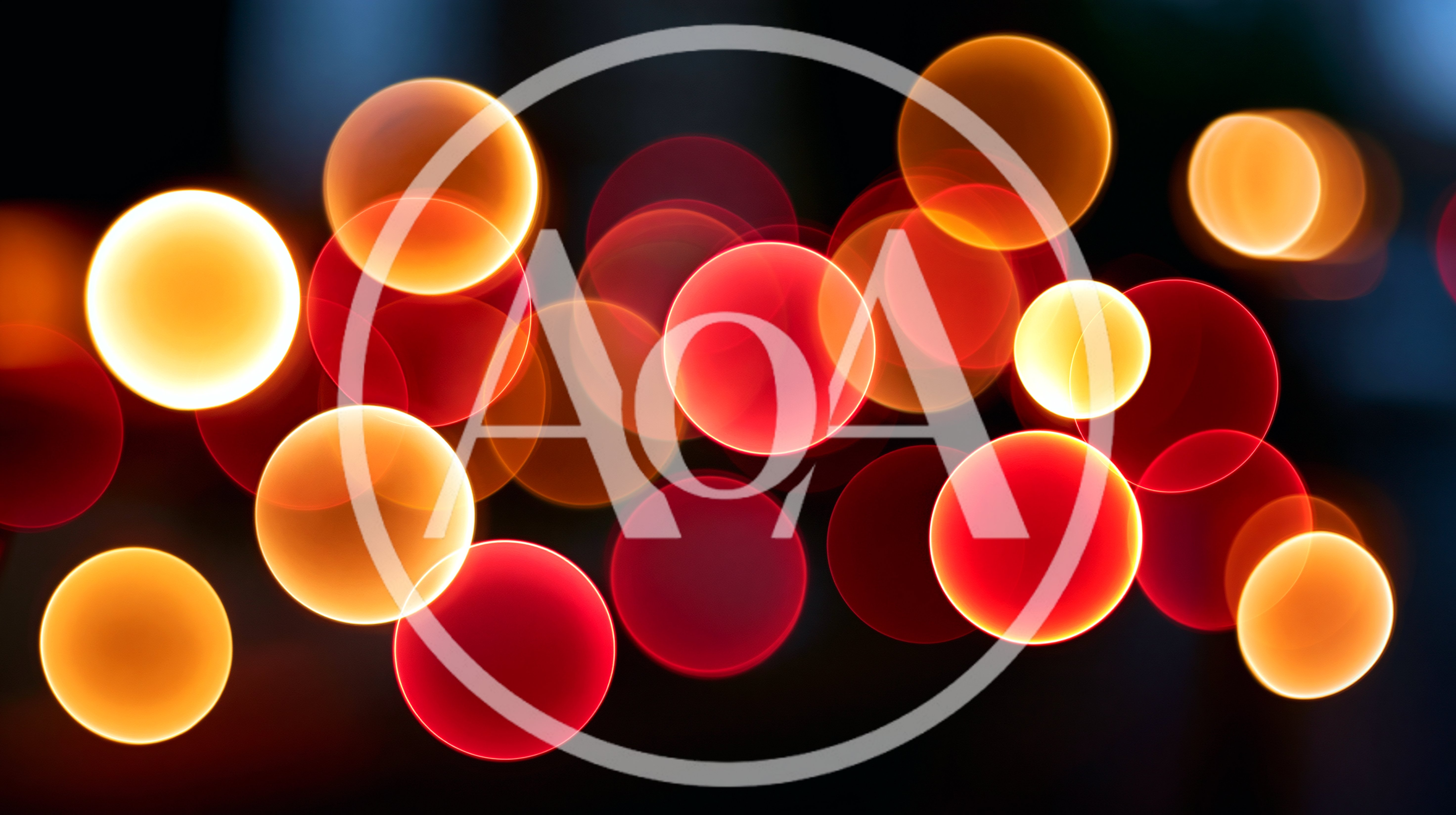 Abstract Bokeh Background With Glowing Red And Orange Orbs