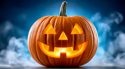 Glowing Jack O Lantern Pumpkin With Foggy Background