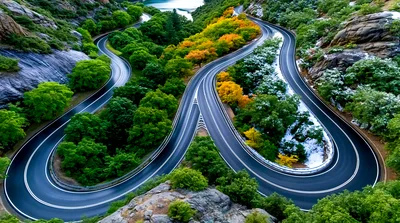 Aerial View Of A Winding Mountain Road