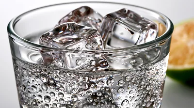 Glass Of Sparkling Water With Ice Cubes