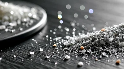 Coarse Sea Salt Crystals On Dark Slate Surface