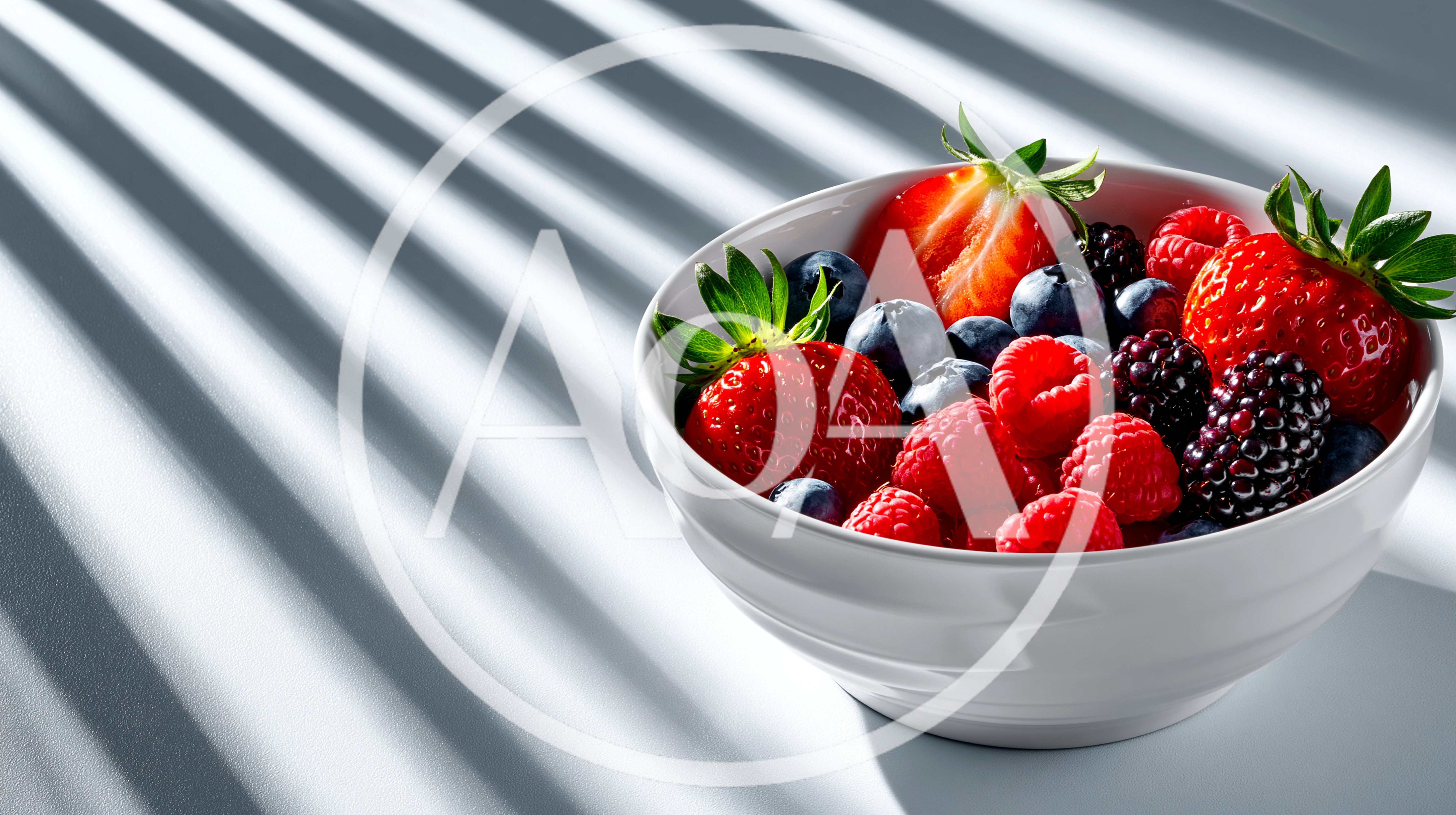 Fresh Mixed Berries In A White Bowl