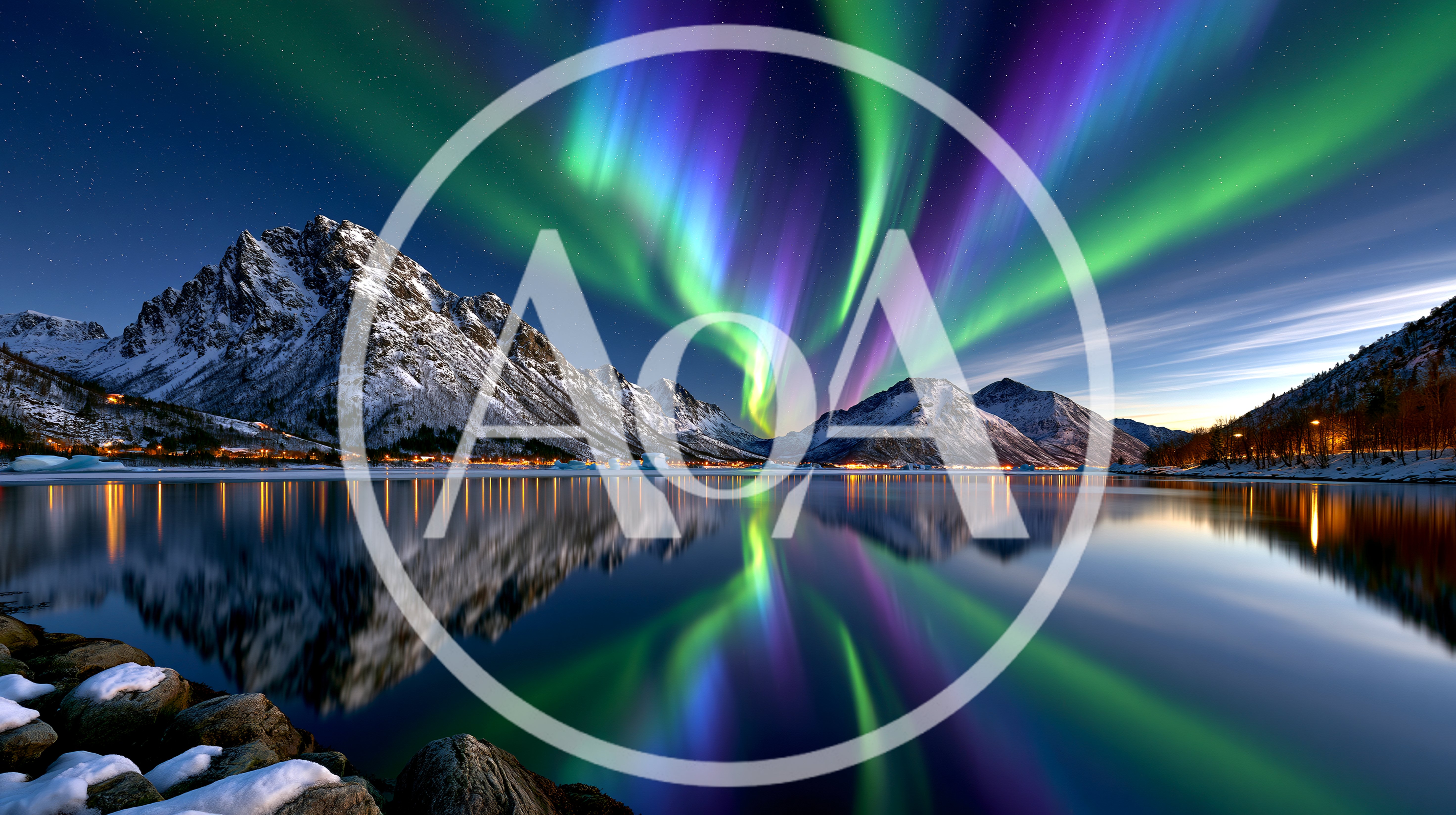 Vibrant Aurora Borealis Over Snowy Mountain Lake