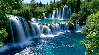 Kravice Waterfalls Cascading Into A Turquoise Pool