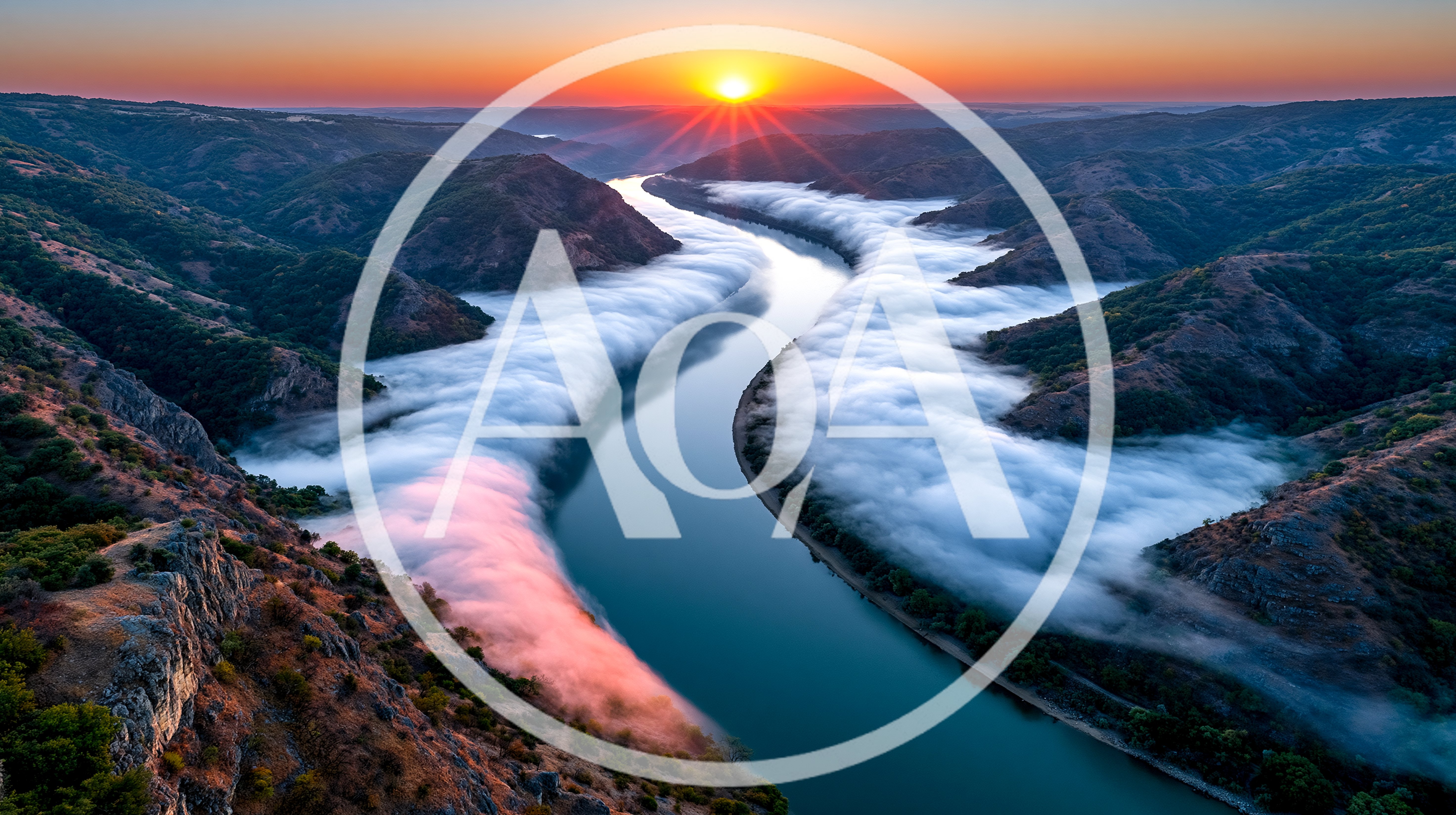 Aerial View Of A Winding River At Sunrise