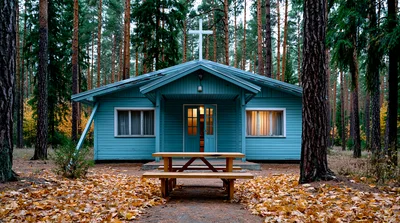 Small Blue Church Cabin in Autumn Forest