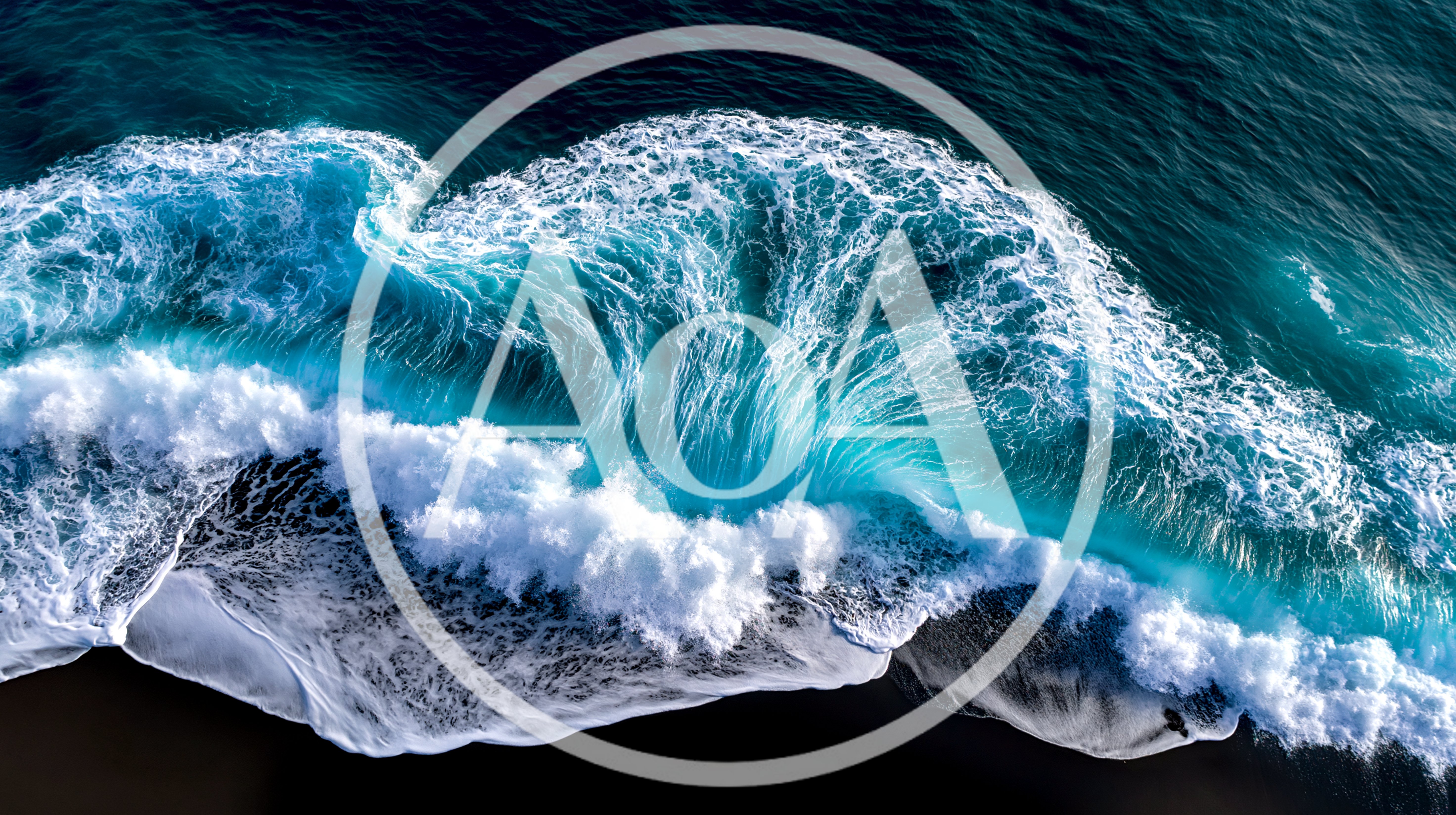 Aerial View Of Crashing Ocean Wave On Black Sand